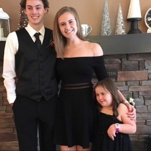 Casual yet formal black over the shoulder dress!